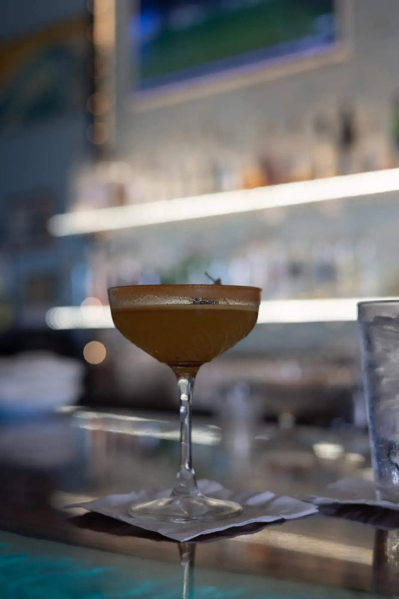 Lilikoi Martini at Jackie Rey's Ohana Grill, Meili vodka, Pierre Ferrand dry curaçao, lilikoi, lemon.