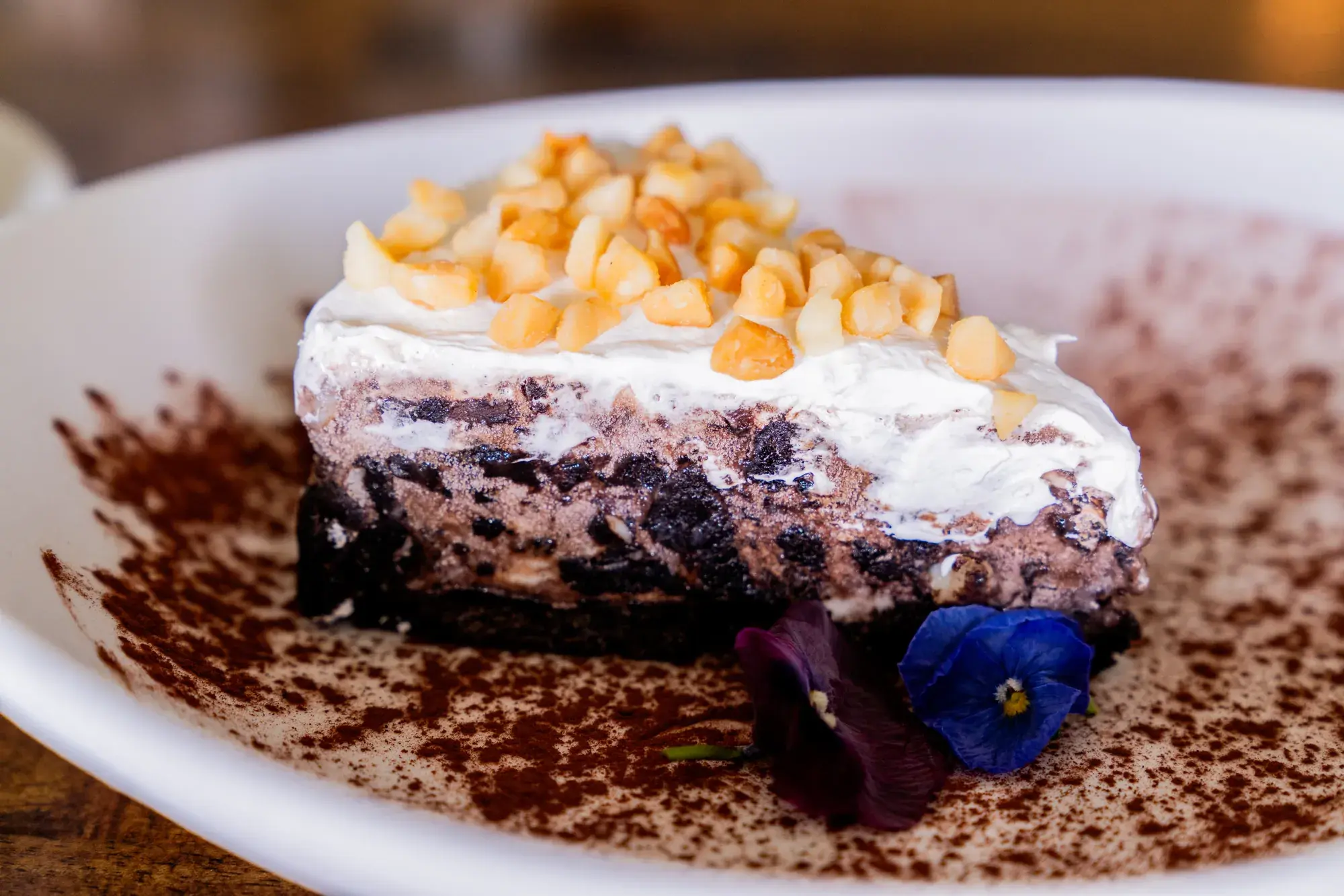 Mud Pie at Jackie Rey's Ohana Grill, Caramel mac-nut fudge swirl ice cream, chocolate cookie crust, whipped cream, mac nuts.